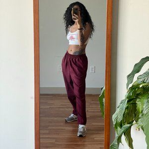 L Petite maroon trousers.
